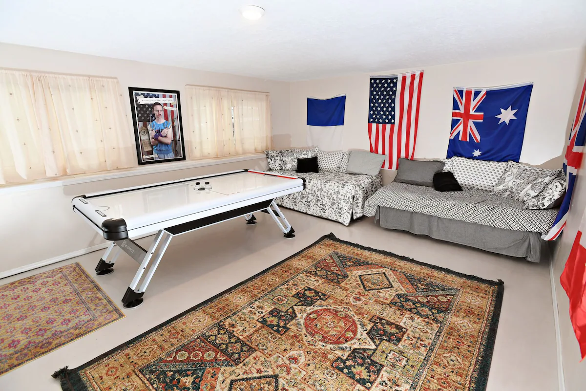 Game room in basement. Opposite the Barracks. Ping Pong and Air Hockey. 2 twin beds